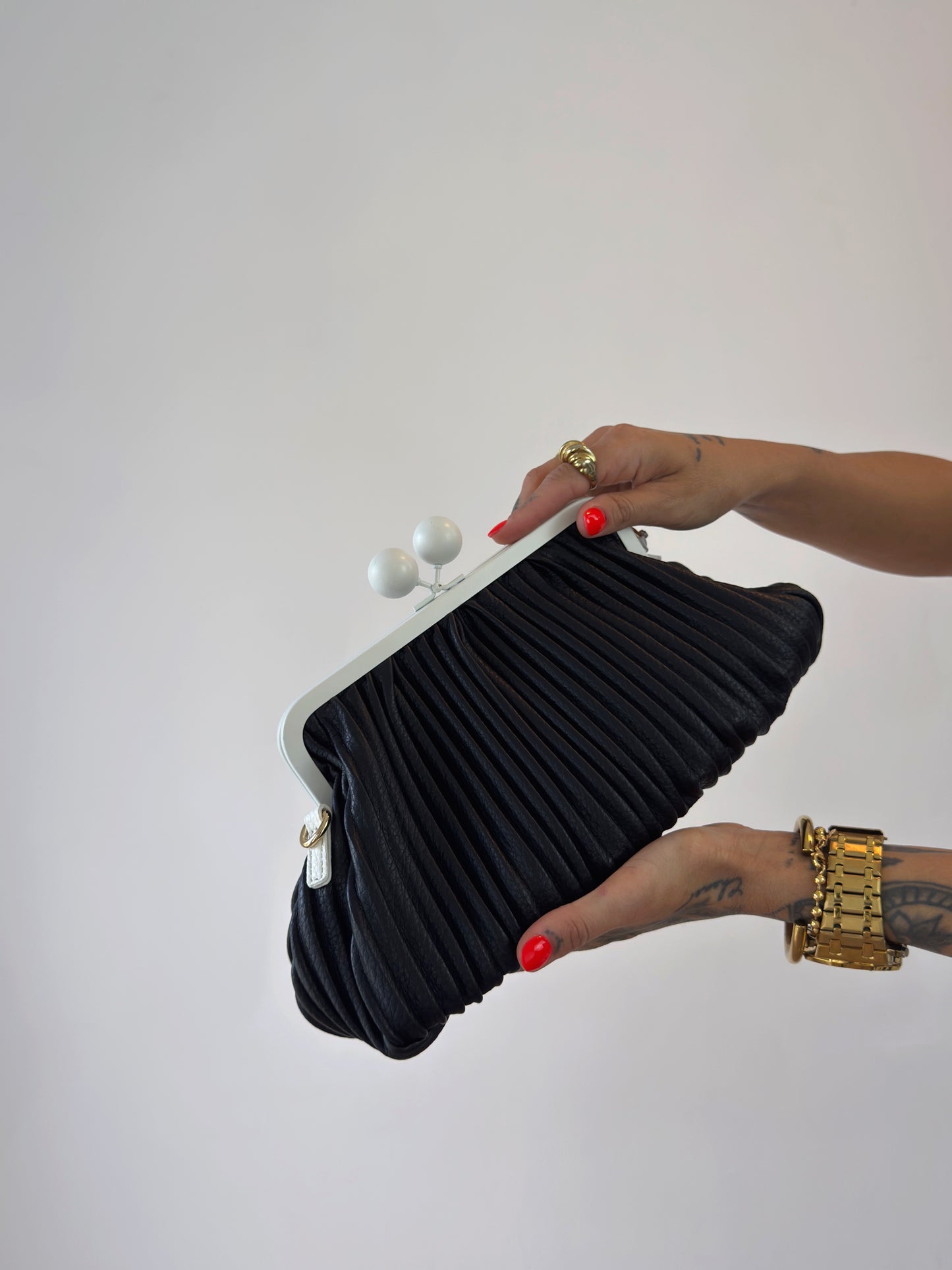 BOLSO DE MANO HYPE