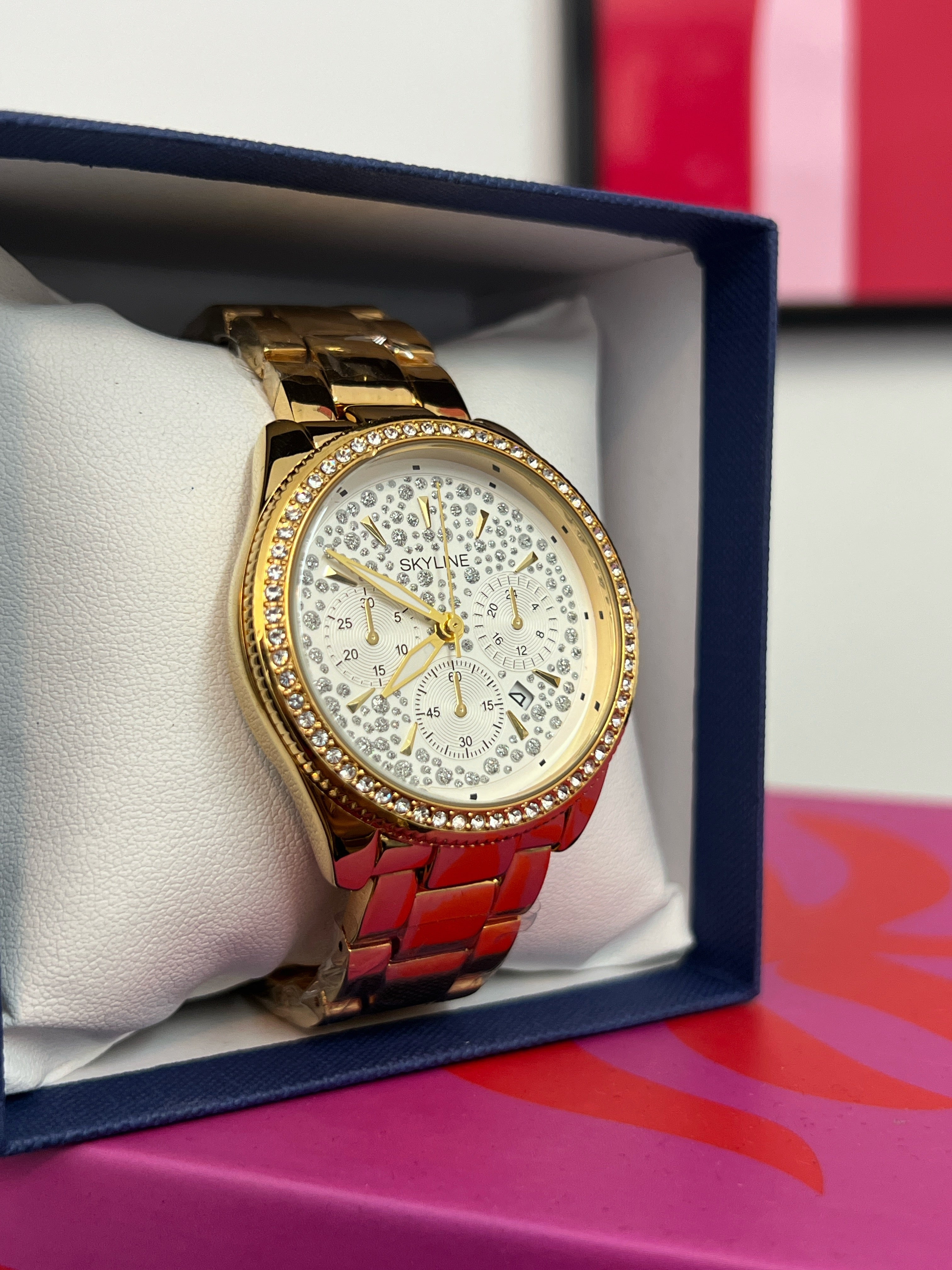 RELOJ SKYLINE SHINNY GOLD