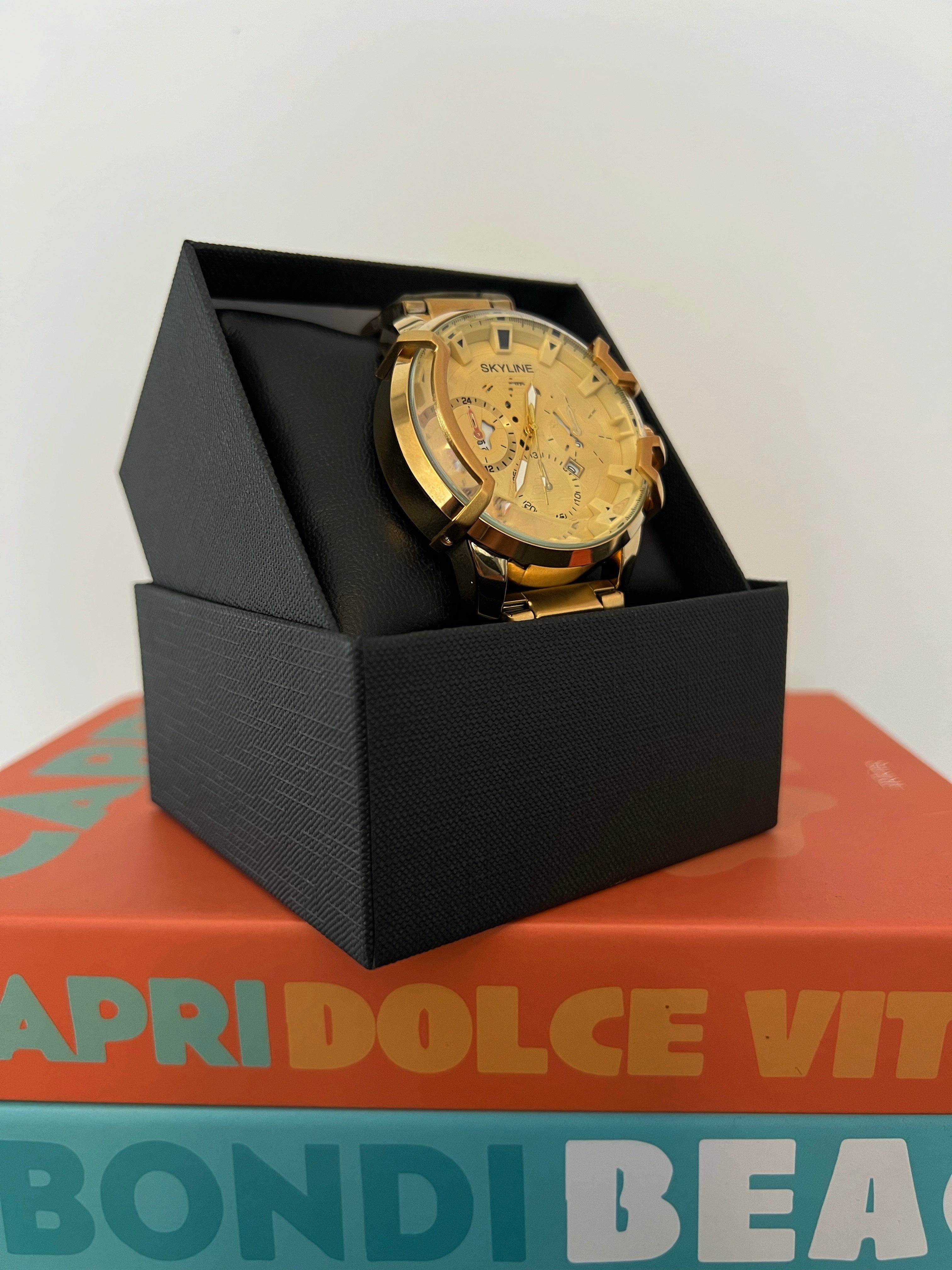 RELOJ SKYLINE GOLD GLASS | UNISEX