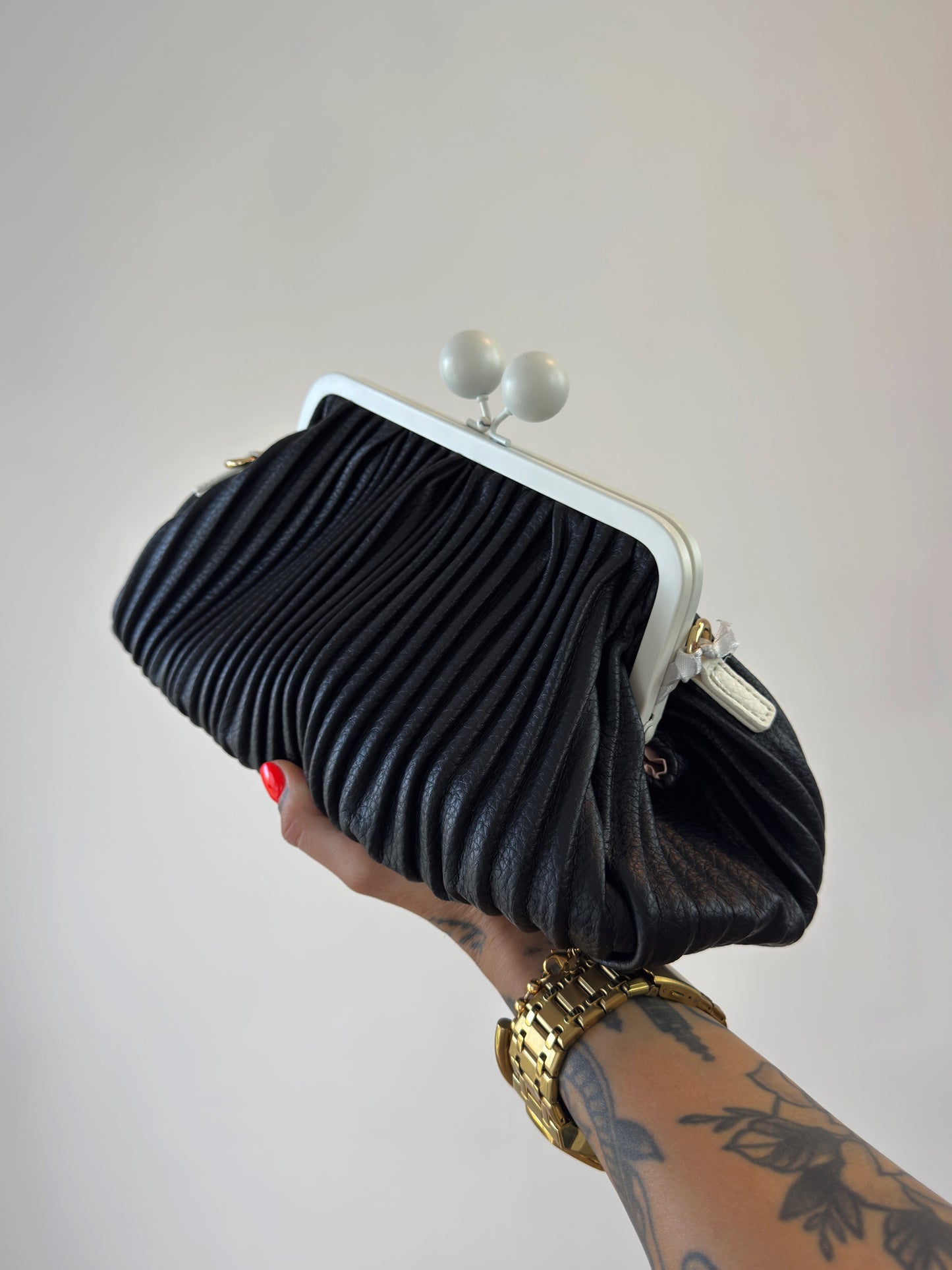 BOLSO DE MANO HYPE