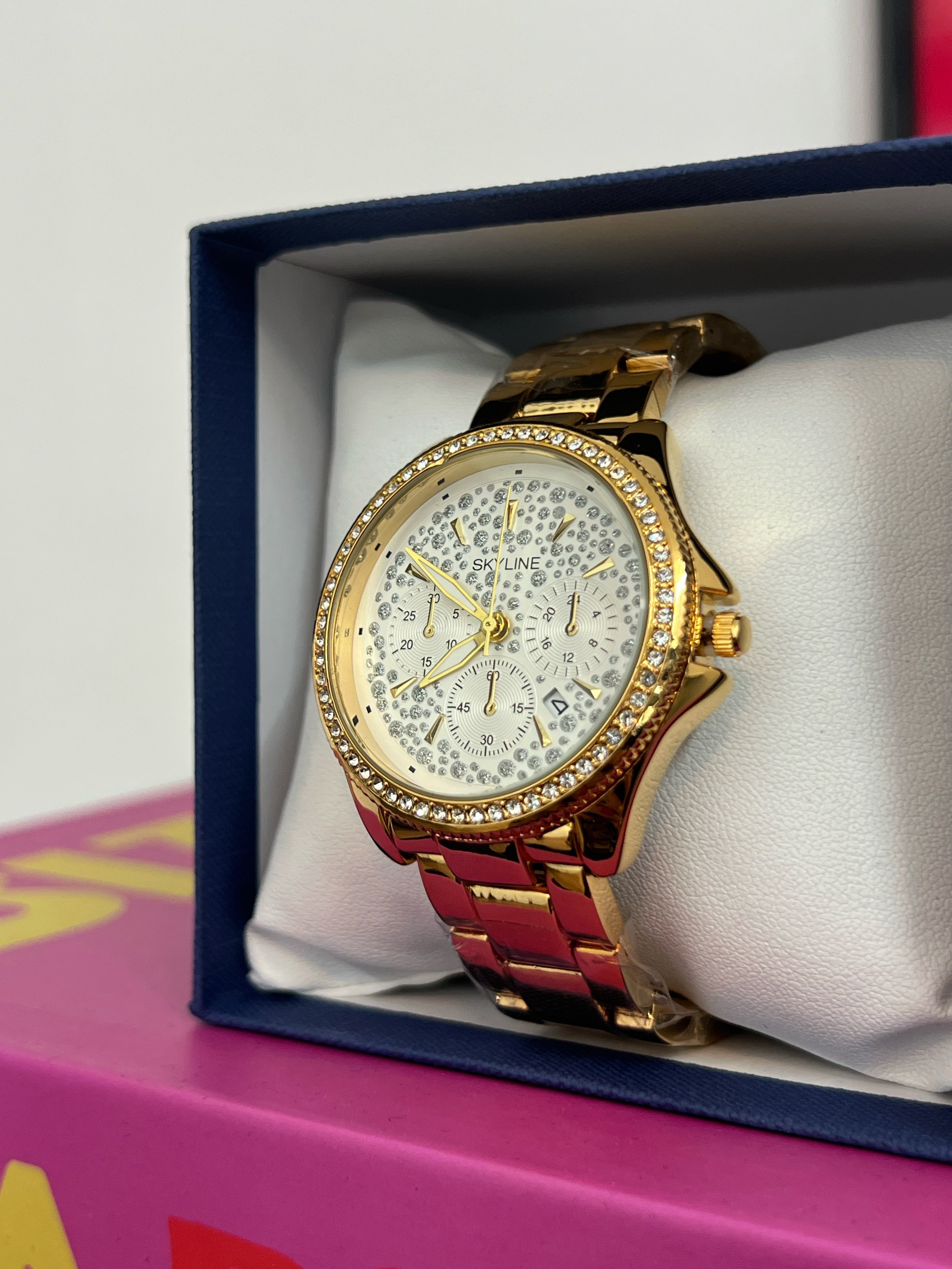 RELOJ SKYLINE SHINNY GOLD