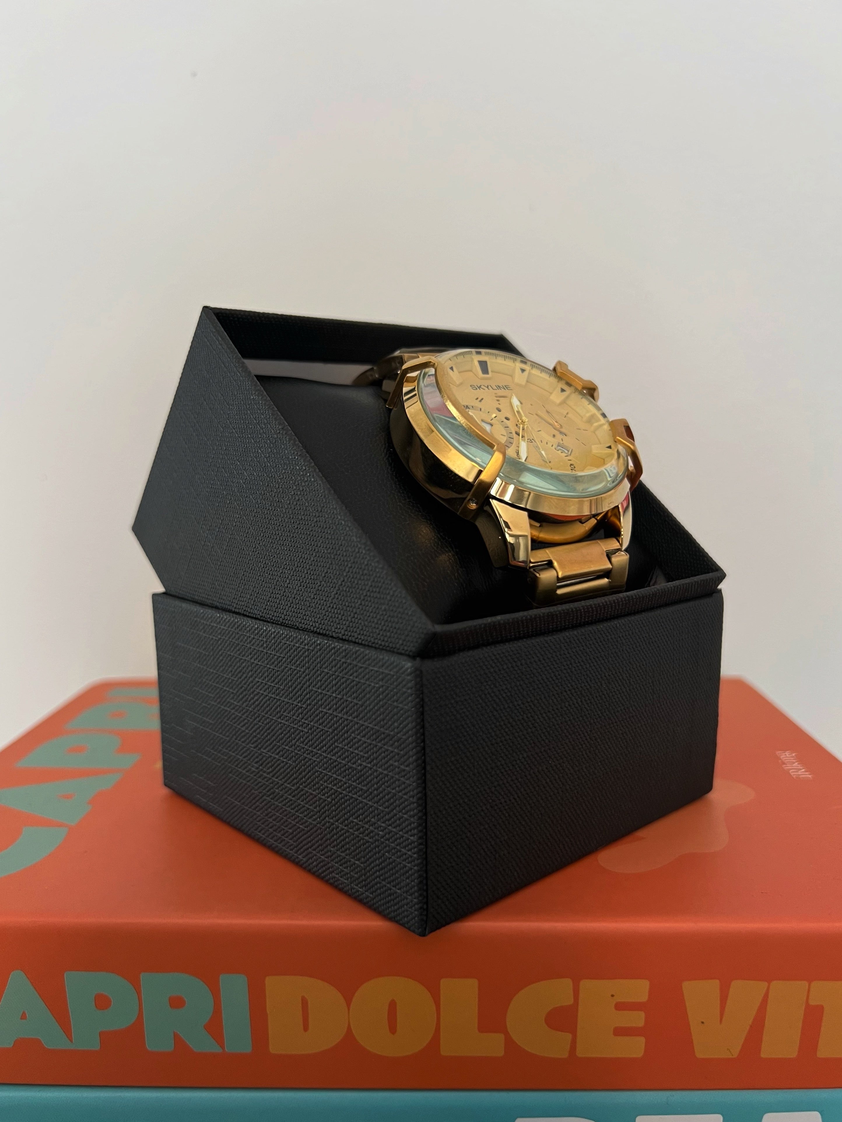 RELOJ SKYLINE GOLD GLASS | UNISEX