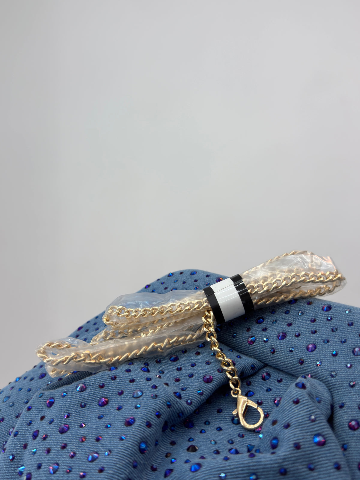 CLUTCH BRIGHT DENIM