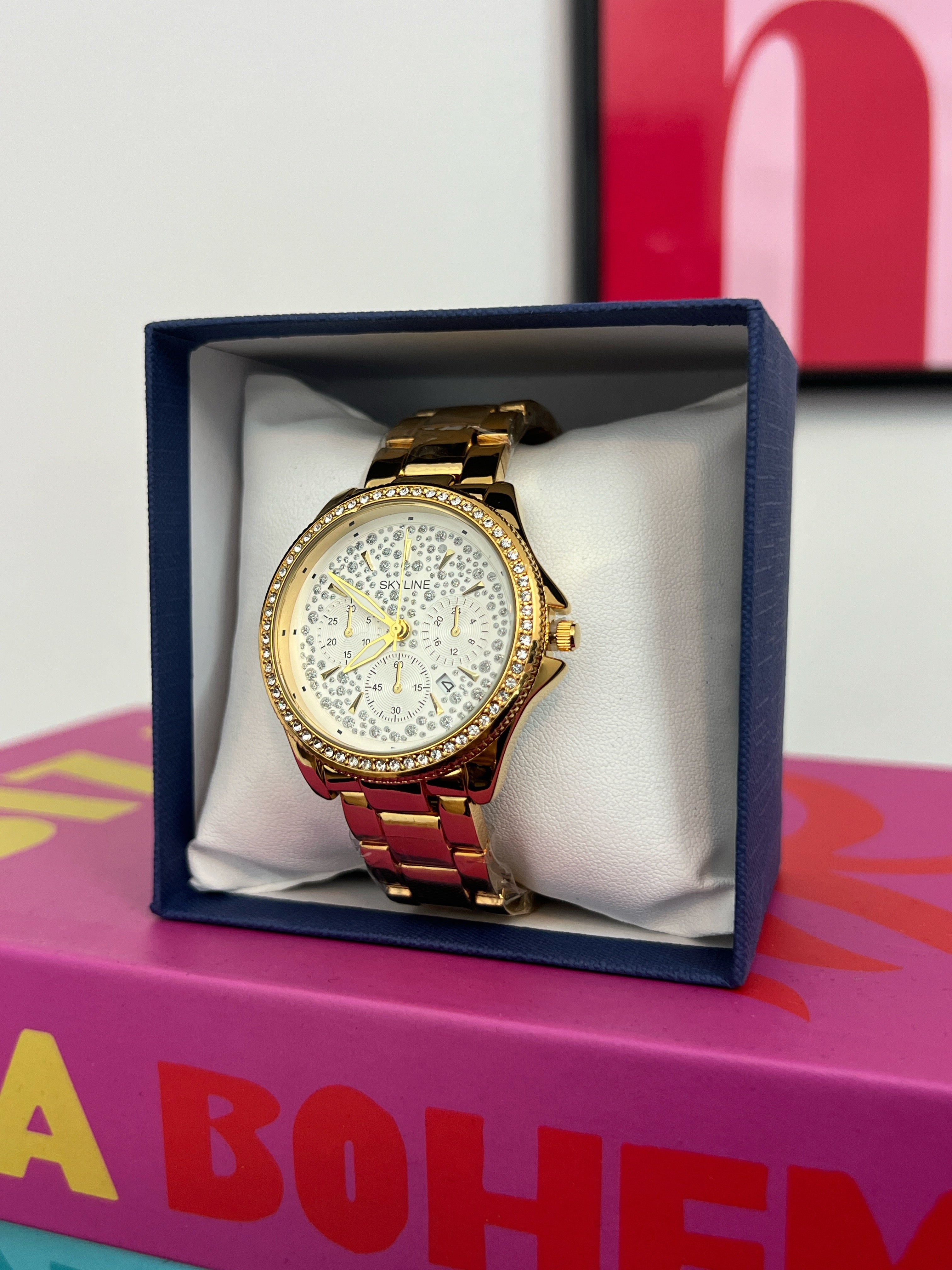 RELOJ SKYLINE SHINNY GOLD