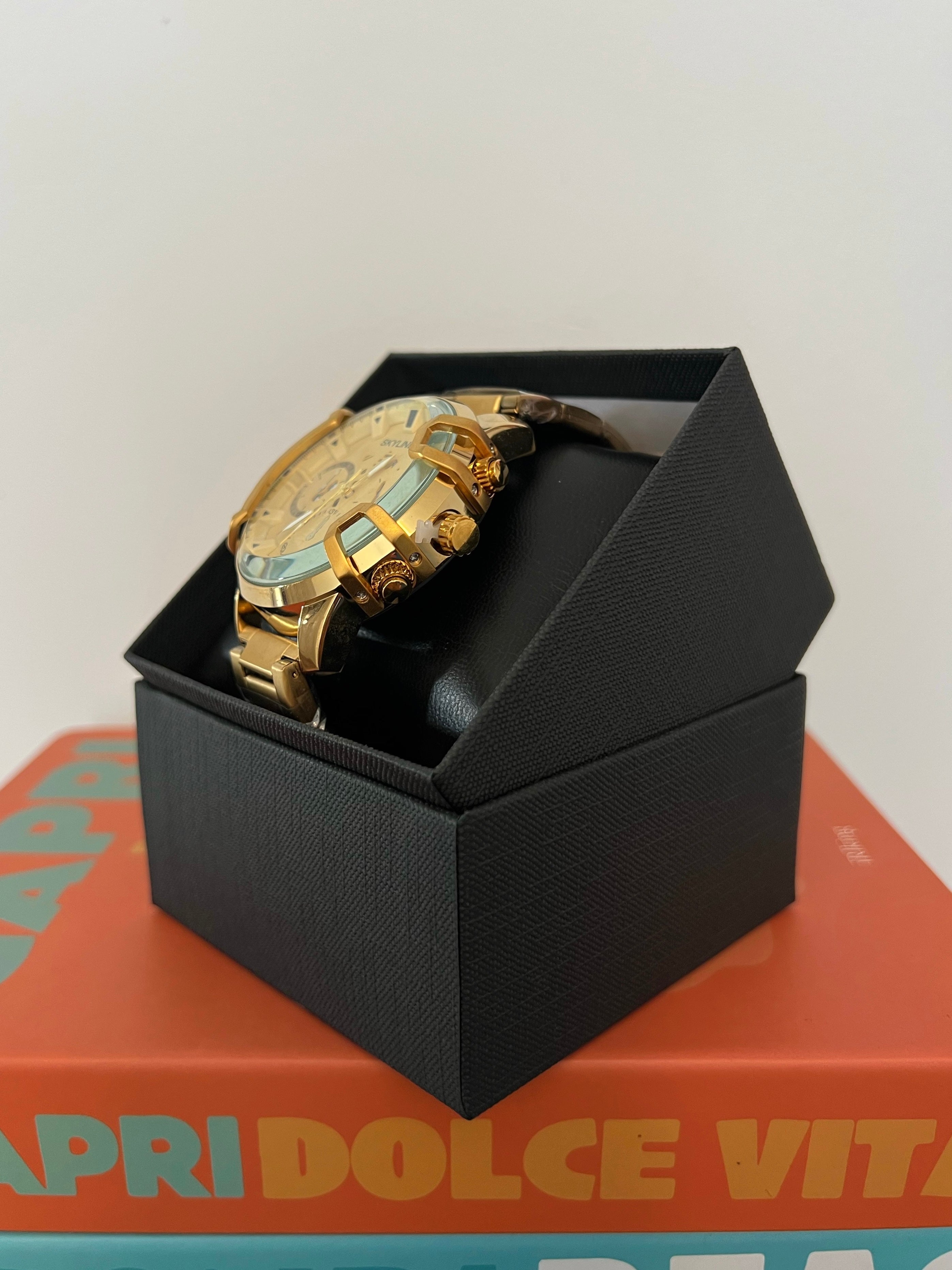 RELOJ SKYLINE GOLD GLASS | UNISEX